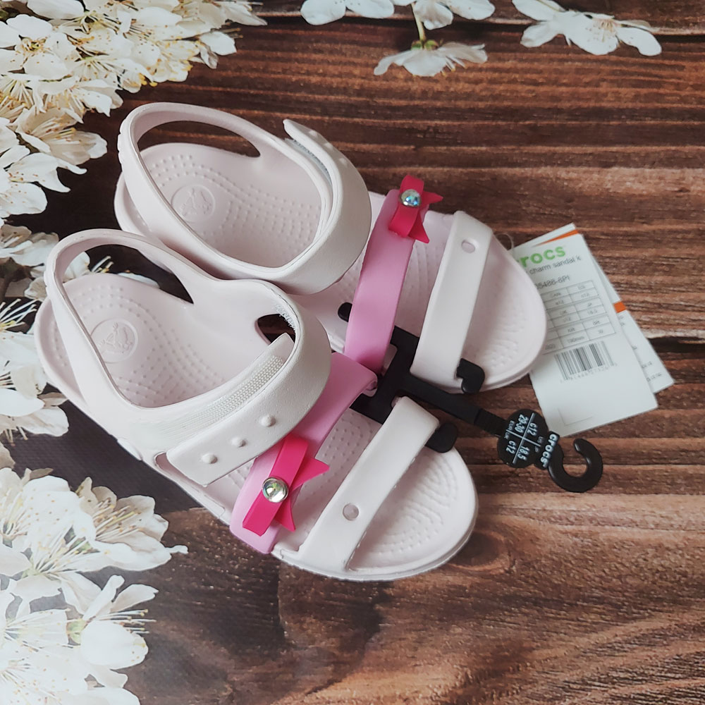 Сандали белого цвета с красным бантиком Crocs (оригинал) — фото 1